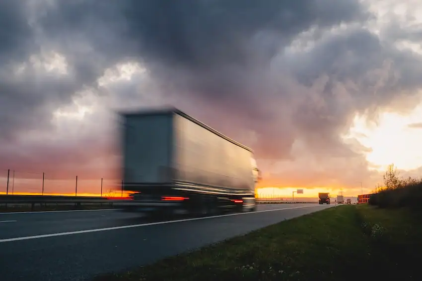 Commercial truck on an Atlanta highway representing truck accident cases a truck accident lawyer would review.