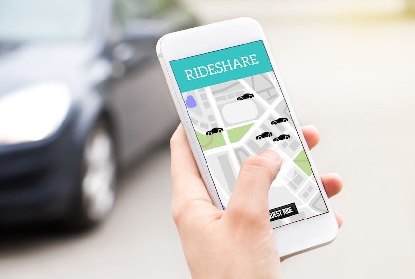 Rideshare app on smartphone representing Uber and Lyft accident claims