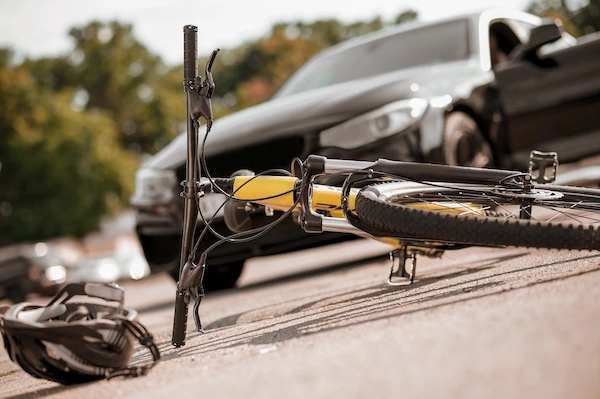 A bicycle and helmet represent a bicycle accident lawyer.